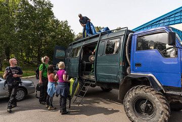 3 Sep: the group has all gathered and we decide to leave already today to Karymsky as a small Pacific cyclon with very bad weather is announced to hit over the next day, probably making flights impossible then. We load our luggage onto Sasha's 4x4 truck. (Photo: Tom Pfeiffer)