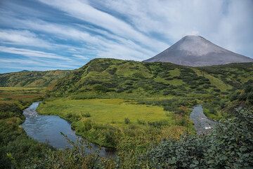 View of the small river and Karaymsky in the background from a hill near the hut. (Photo: Tom Pfeiffer)