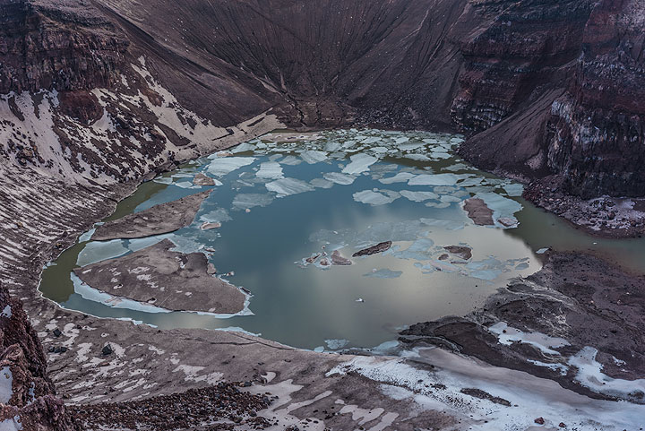 Ice covering parts of the central crater lake. (Photo: Tom Pfeiffer)