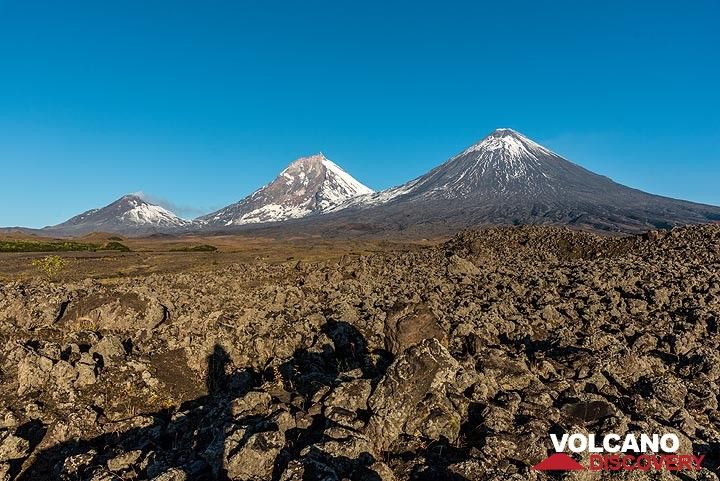 View of Bezymianny (l), Kamen (m), and Kluychevskoy (r) volcanoes from the east. (Photo: Tom Pfeiffer)