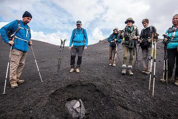 We find a very fresh volcanic bomb impact at the feet of the cone. (Photo: Tom Pfeiffer)