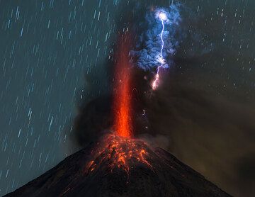 During our Colima Volcano Special in January 2016, we spent several days and nights to observe the volcano's ongoing intermittent explosive activity. 
Due to reasons not well understood, Colima's eruptions in the past few months have been unusually rich in eruption lightnings that develop in the ash plumes, even during smaller explosions, something that had not been observed during a phase of similarly intense explosive activity a year ago (photos). (Photo: Tom Pfeiffer)