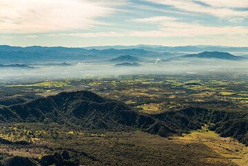 View towards Colima town under the morning haze. (Photo: Tom Pfeiffer)