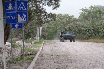 Military patrols the evacuated areas to prevent looting. (Photo: Tom Pfeiffer)