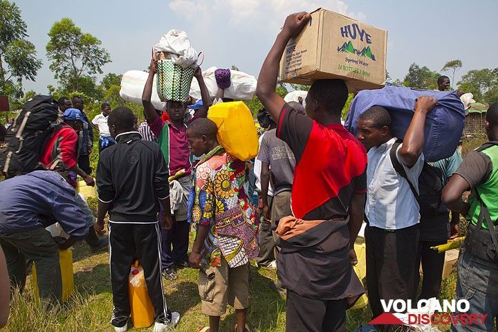 After the porters have been selected though an allotment, it is time to start and load food, gear and water. (Photo: Tom Pfeiffer)