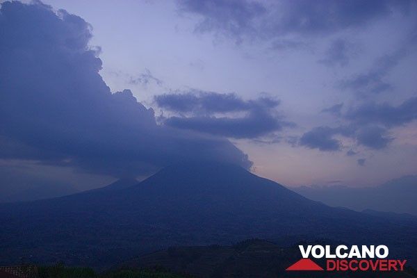 Evening image of steaming Nyiragongo volcano from nearby Rwanda. (Photo: Tom Pfeiffer)