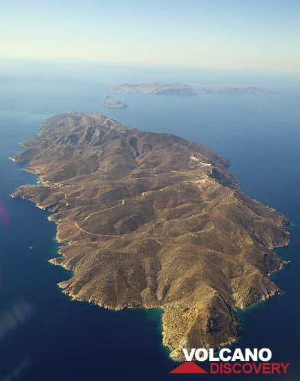 Aerial view of the Island of Sikinos seen from the NE. Folegandros Island in the background. (Photo: Tom Pfeiffer)