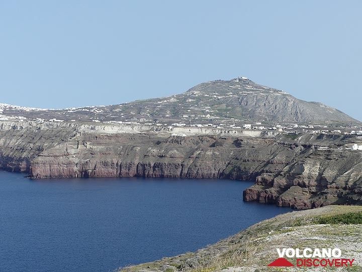 View of the the central caldera cliffs and the limestone mountain of Profitis Ilias which represents another part of the pre-volcanic island of Santorini. (Photo: Ingrid Smet)