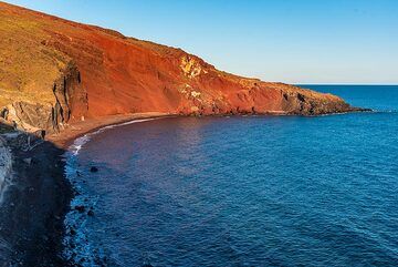 Soleil du soir sur la plage rouge (Photo: Tom Pfeiffer)