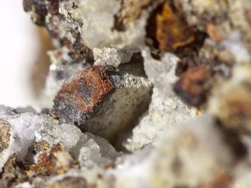 Single Galenite crystal (corroded and covered by Cerusite) (Photo: Tobias Schorr)