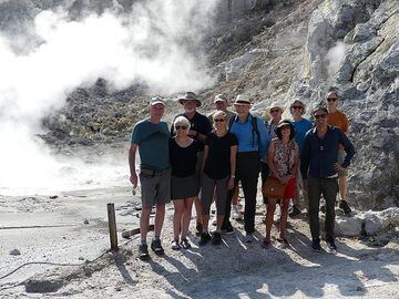 Group photo in front of one of the Phlegraean fiels' many hydrothermal areas with volcanic degassing, sulphur mineralisations and bubbling mud pools. (Photo: Ingrid Smet)