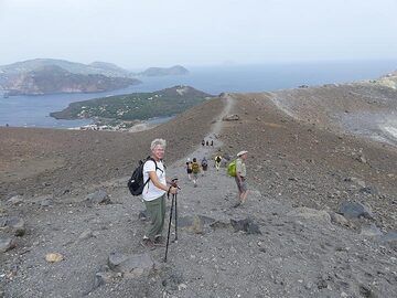Completing our hike around the La Fossa crater with the young volcanic peninsula of Vulcanello (centre left) and Lipari (top left) in the background. (Photo: Ingrid Smet)