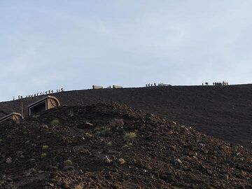 Stromboli's summit area consists of a half circle rim or amphitheater, the remnants of older calderas, from where the activity of the active vents on the present day crater terrace can be observed. With beautiful weather like today, there are many groups who make the hike to the summit! (Photo: Ingrid Smet)