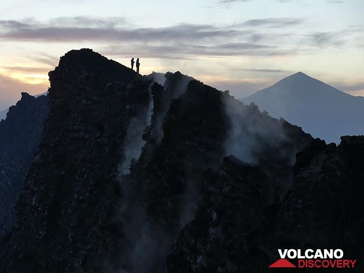 Day 5 - Watching the sun rise between Mikeno and Karisimbi (right) volcano (Photo: Ingrid Smet)