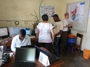 Day 6 - Studying the geological map of Nyiragongo and the volcano´s seismic signal at the Goma Volcano Observatory  (Photo: Ingrid Smet)