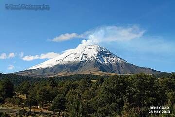 Popocatepetl is one of Mexico's most active volcanoes and also part of an Aztec legend, a warrior who fell in love with a young woman (Iztaccihuatl) who died while he was away in battle. He is said to be still mourning for her.

Popocatepetl is located more or less 40 miles southeast of Mexico City. (Photo: RGoadPhotography)