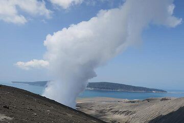 The island of Sertung seen behind the steam plume from the crater lake. (Photo: AndreyNikiforov)