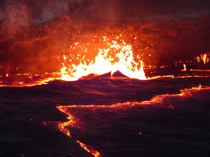DAYS 5-6-7: Erta Ale - An exploding lava bubble bursts through the thin black crust of the lake. (Photo: Ingrid)