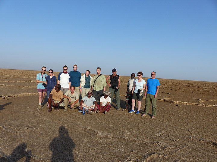 DAY 10: Lake Assale - A group picture on a dried out part of the salt lake, enthusiastically taken by one of our drivers! (Photo: Ingrid)