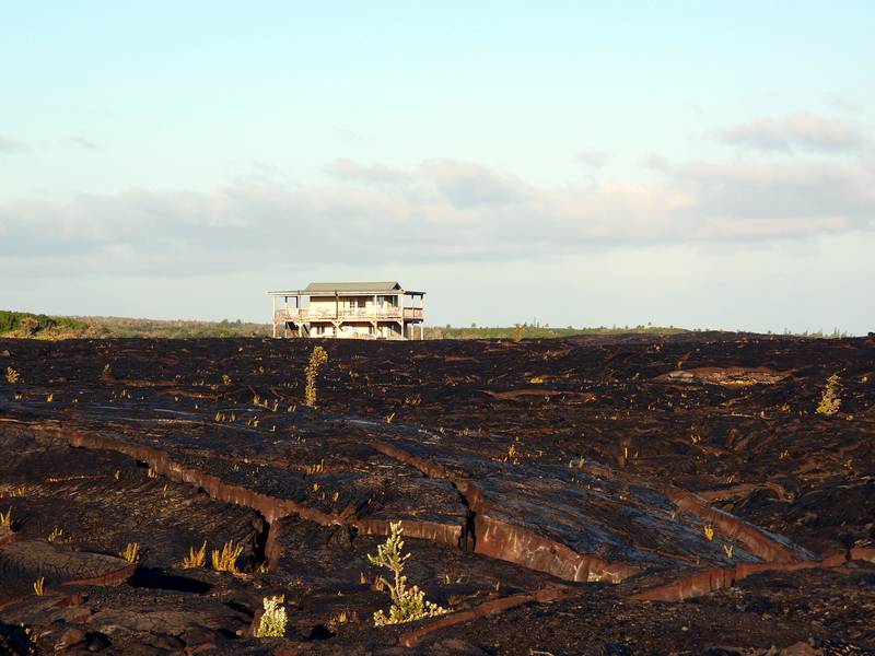 House in the community of Kalapana, Big Island, Hawaii. The area has been repeatedly covered by lava flows. (Photo: Janka)