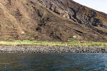 Punta Lena with the slopes burnt by the bush fires ignited during the 3 July 2019 eruption behind. (Photo: Markus Heuer)