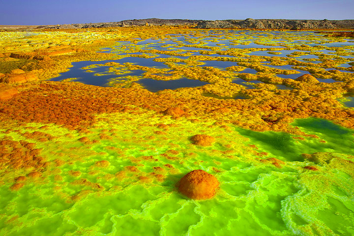 Green and orange salt formations and colorful ponds at Dallol (Danakil desert, Ethiopia). (Photo: Roland Gerth)
