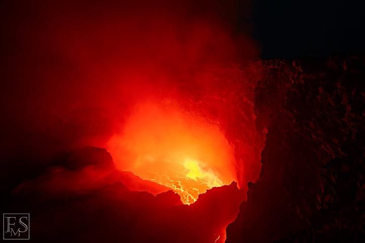 Strong degassing from the lava lake often (partially) obscures the actively boiling lava lake at the bottom of the south crater in Erta Ale's summit caldera (c)