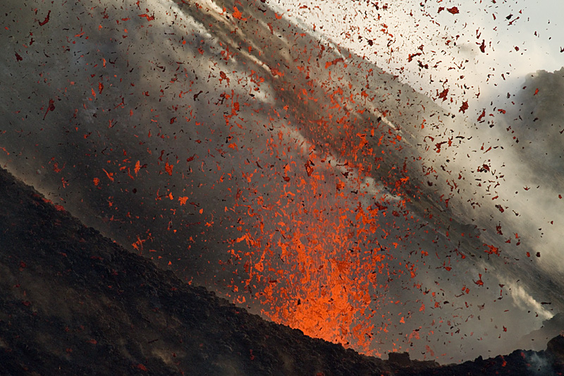 Eruption from NE crater of Stromboli volcano ejecting liquid lava spatter. The eruptions lasted more than a whole minute. May 15, 2012 (Photo: marcofulle)