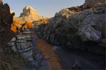 The weathered salt deposits at Dallol look like the sandstone pyramids found elsewhere around the globe. (Photo: shinkov)