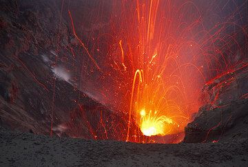 Two erupting vents in the western crater of Yasur (Photo: Tom Pfeiffer)