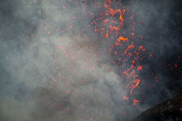 Liquid spatter ejected during an explosion of Yasur volcano (Photo: Tom Pfeiffer)