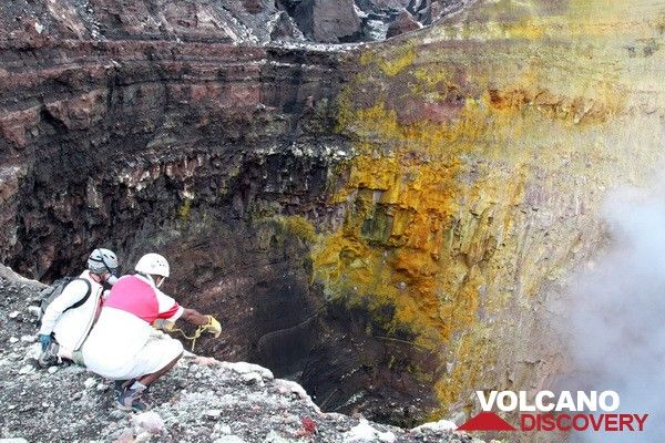 Looking into one of the deep pit craters inside Bembow volcano, Ambrym (Vanuatu). The northern wall is crusted over with yellow sulfur deposits mostly from sublimation of the fumes emanating from the lava lake. Taken during the recent expedition to Vanuatu. (Photo: Yashmin Chebli)