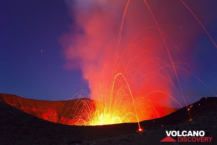 Powerful strombolian explosion throwing glowing bombs out of the crater and some over the viewer's observation point. (Photo: Tom Pfeiffer)