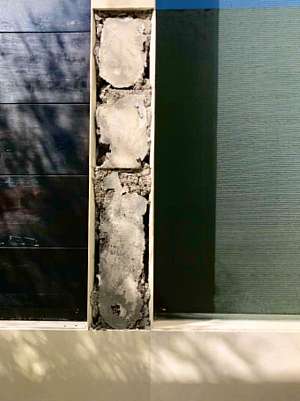 Tile fell from wall outside my villa in Seminyak, Bali. (public domain)