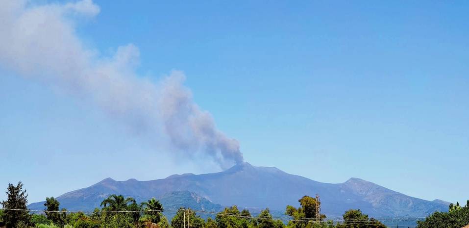 An ash plume rising from Etna volcano (image: INGV)