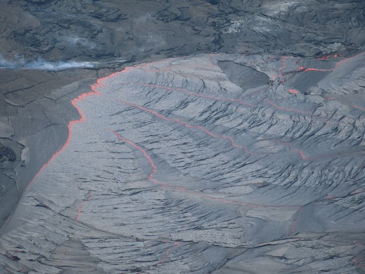 A close up view of the inlet at the western margin of the lava lake in Halema‘uma‘u Crater, at the summit of Kīlauea. The lava stream was covered in a thin, flexible crust and was moving at a very slow velocity. (Image & caption: USGS-HVO, M. Patrick on April 13, 2021.)