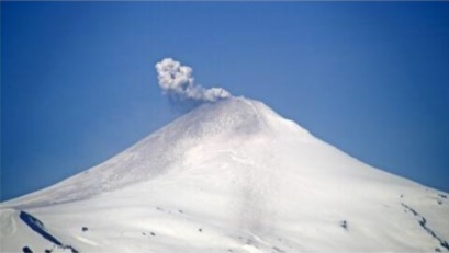 An ash plume with ash deposits from Villarica volcano on 23 October (image: @Sernageomin/twitter)