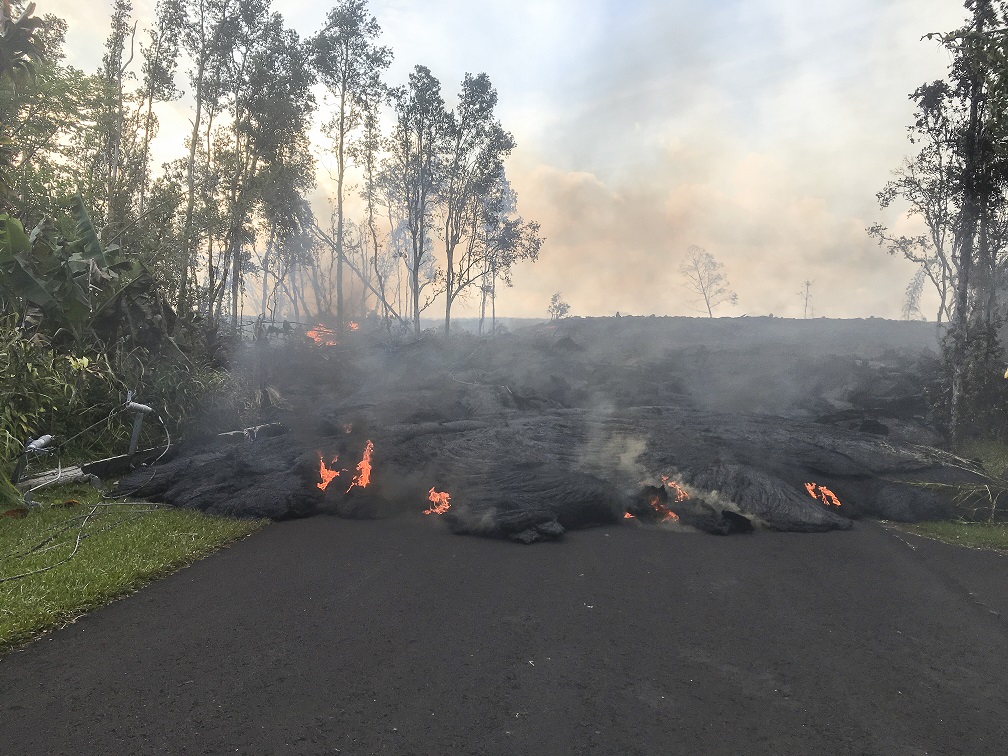 May 31 photograph showing lava from fissure 8 advances on Kahukai Street, the flow being as much as 3.5 yards in height. (HVO/USGS)
