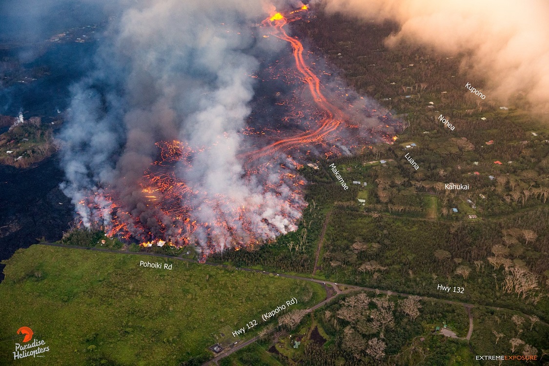 Kilauea's lower east rift zone overflight on Monday, May 28, 2018, 5:45 am, with Paradise Helicopters and Extreme Exposire. Fissures 8 and 24 were the only ones actively erupting but it seemed that the volume from other fissures was also being released at this location where a massive flow was on the move and consumed a dozen houses while the helicopter was hovering there. (image:  Karyn Spencer)