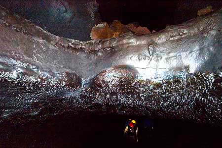Hike through an ancient lava cave