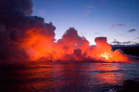Watching the lava entering the sea from the sea