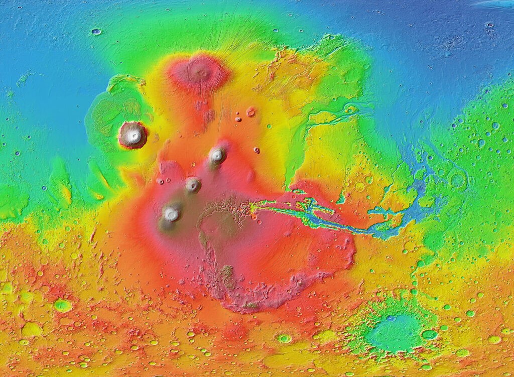 Topographic map of the Tharsis region (red/brown area) and the Valles Marineris canyon identified in its eastern region (Image: NASA).