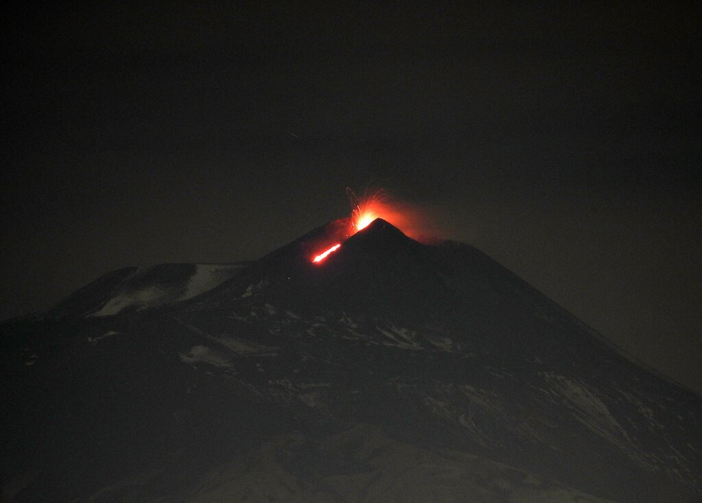 Elevated strombolian activity and the lava overflow from the Southeast Crater last night (image: Boris Behncke)