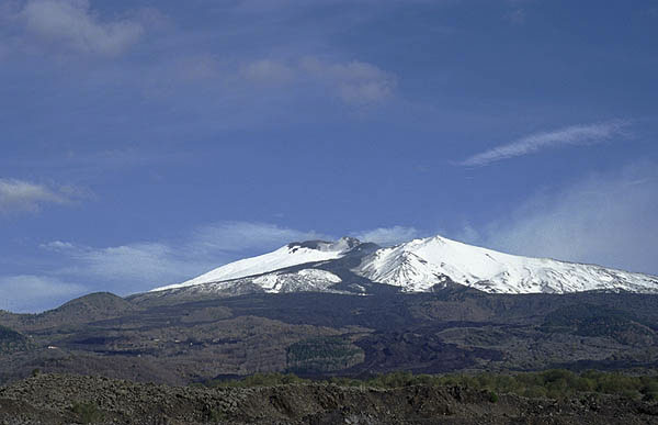 Snow-covered Etna volcano with the fresh lava flows from 2002/03