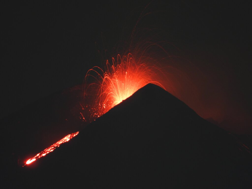Elevated strombolian activity and the lava overflow from the Southeast Crater last night (image: Boris Behncke)