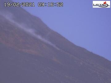Blurry image of the LAVE webcam showing the lava flow as well