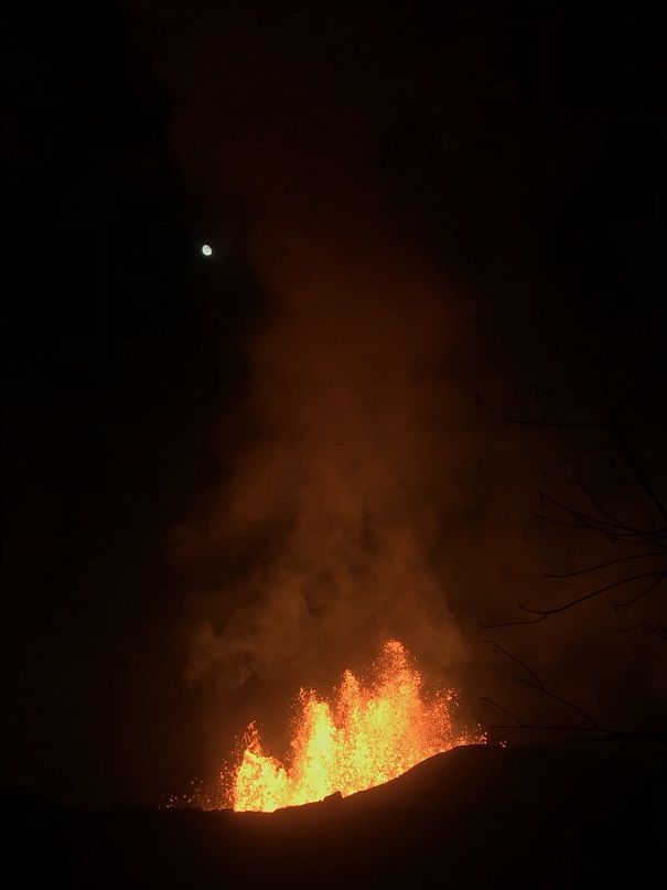 Although continuously active, lava fountaining from fissure 8 temporarily decreased to heights of about 50 m (164 feet) during the night from 1 to 2 June . The moon can be seen in the upper left. (HVO/USGS)