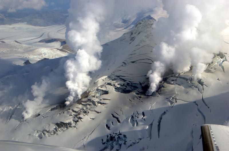 Aerialphoto of the summit of Fourpeaked volcano on an overflight on the 24th of Sep 2006 showing several steaming vents on its summit. (Photo courtesy: Cyrus Read, AVO/USGS)