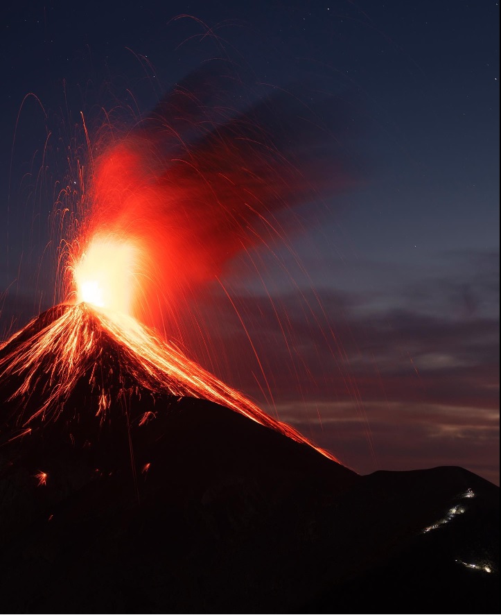 Glowing lava bombs and its ballistic trajectory during an eruption from Fuego volcano (image: Diego Rizzo Photo)