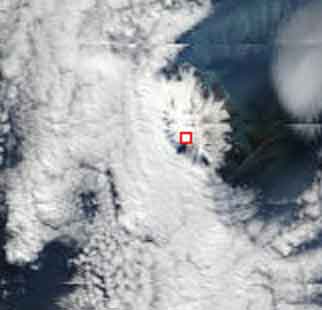 Terra / MODIS satellite image with Heard island on 17 March 2013. Note the dark spot west (left) of the summit, likely a fresh lava flow.